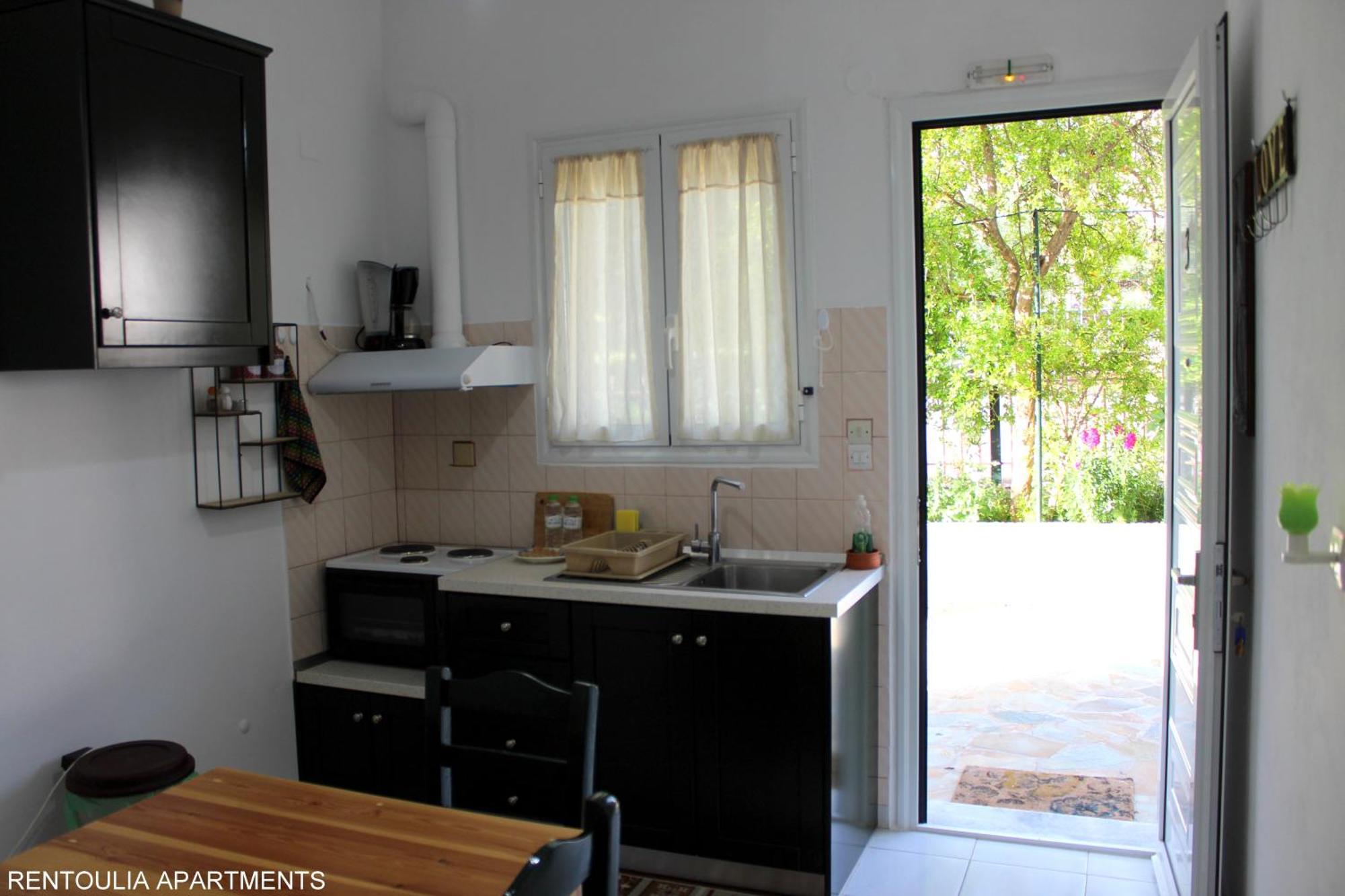 Rentoulia Apartments Poúlithra Esterno foto